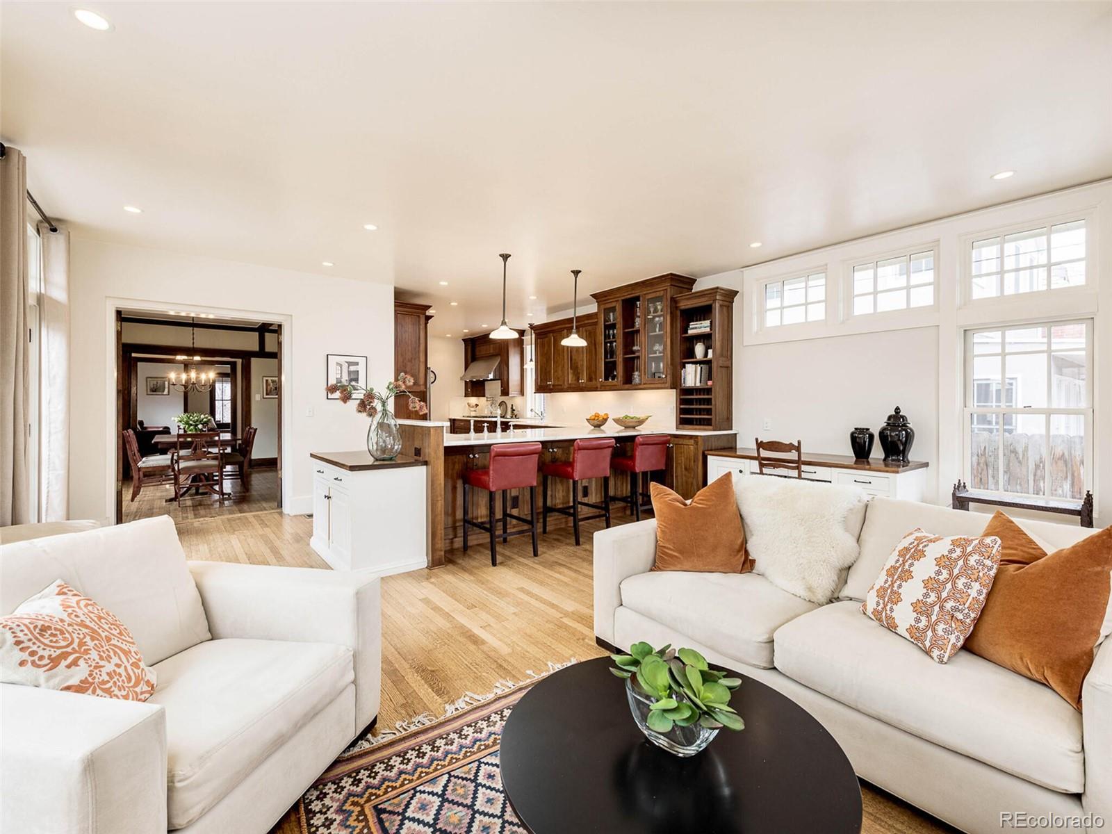 720 Franklin Street Denver, CO 80218 - Photo 12 of 38 a living room with furniture and a large window