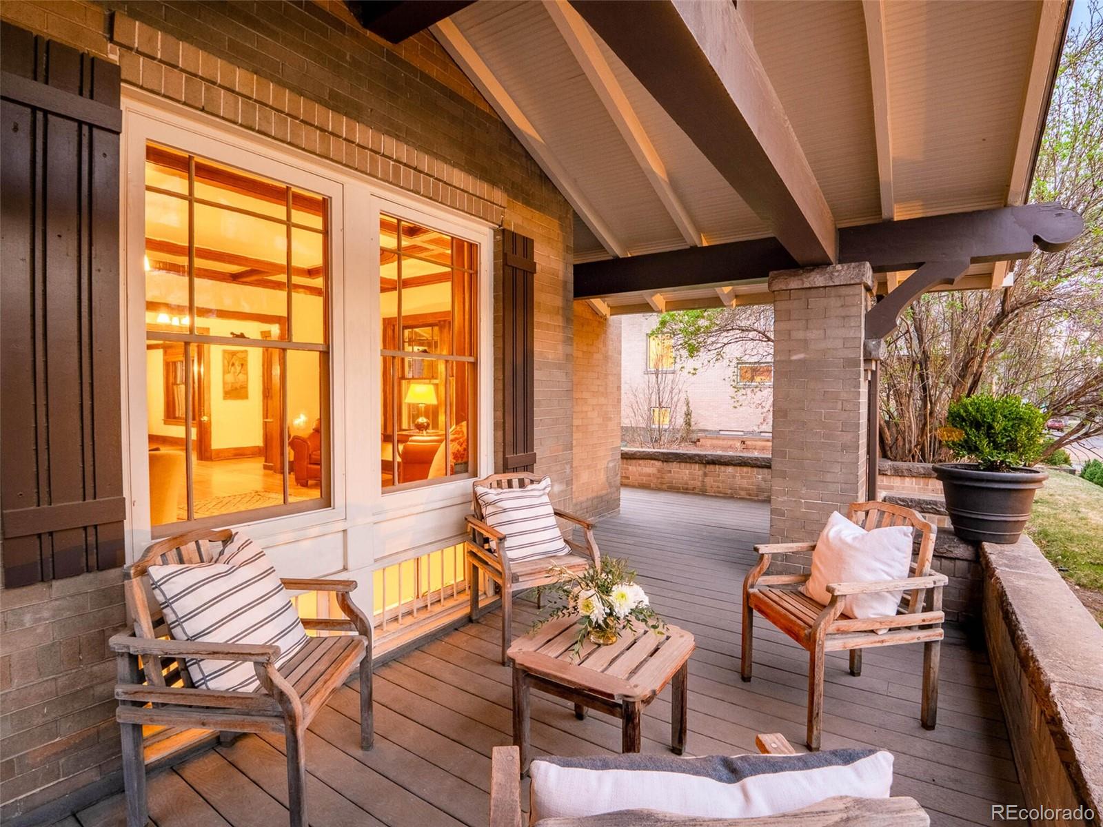 720 Franklin Street Denver, CO 80218 - Photo 2 of 38 a living room with furniture and a large window