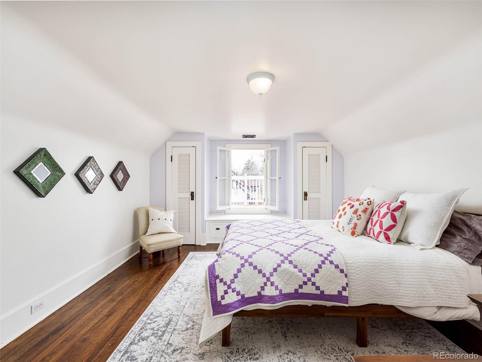 720 Franklin Street Denver, CO 80218 - Photo 25 of 38 a bedroom with a bed and a couch