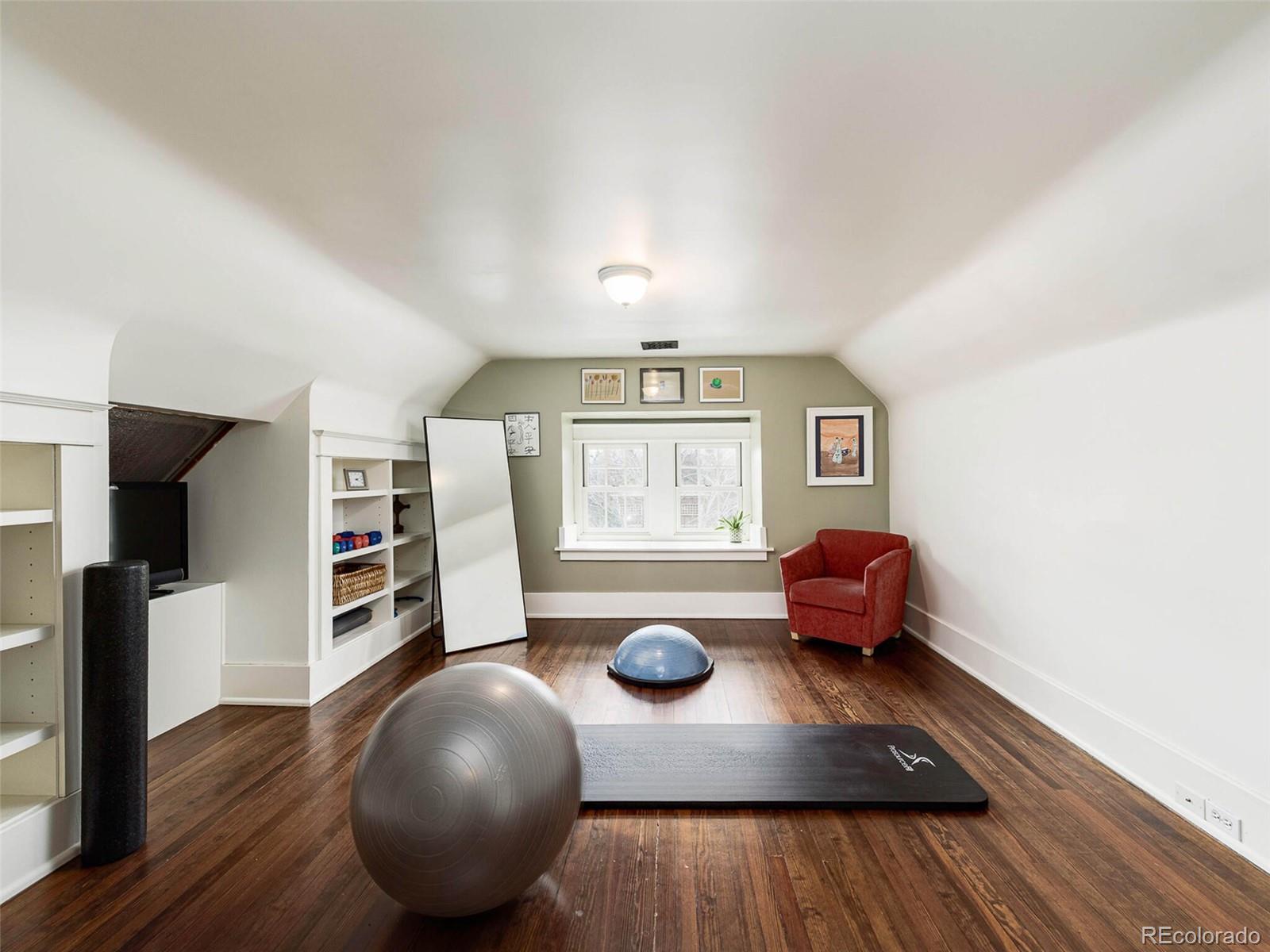 720 Franklin Street Denver, CO 80218 - Photo 26 of 38 a living room with furniture and a wooden floor