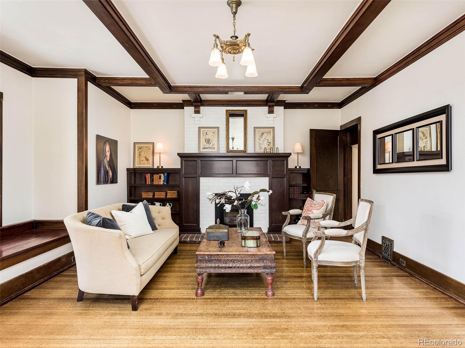720 Franklin Street Denver, CO 80218 - Photo 5 of 38 a living room with furniture and a fireplace