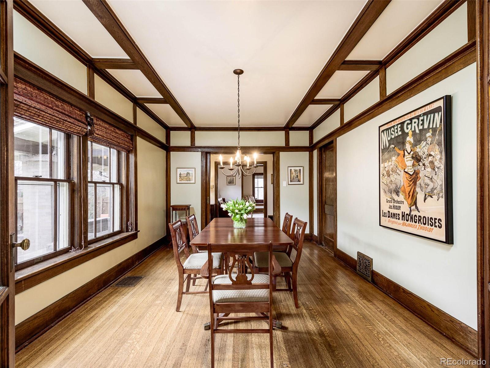 720 Franklin Street Denver, CO 80218 - Photo 7 of 38 a view of a dining room with furniture window and wooden floor
