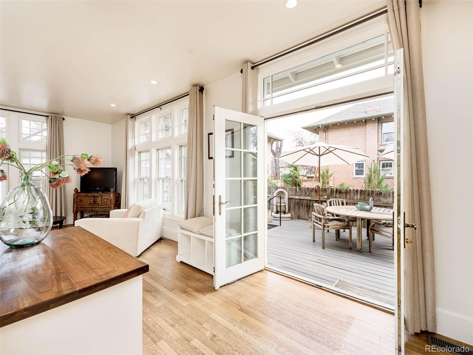 720 Franklin Street Denver, CO 80218 - Photo 9 of 38 a view of a living room and a window