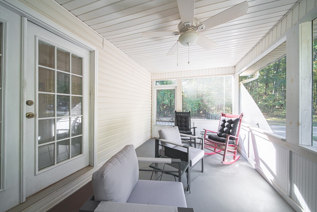 200 Lake Amah Lee Road Hampton, GA 30228 - Photo 29 of 29 a living room with furniture and a window