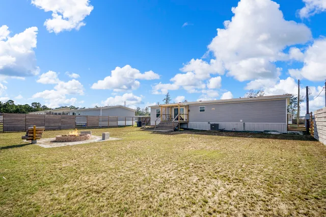 a view of a swimming pool with an ocean view