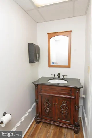 an empty room with windows and entrance