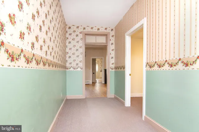 en empty room with windows