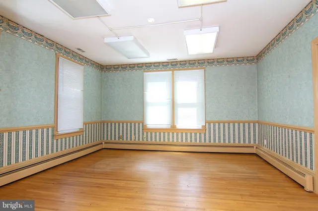 a view of an empty room and window