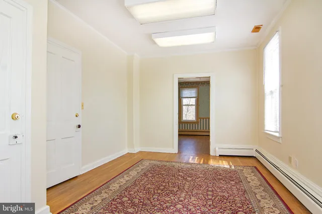 a bathroom with a sink toilet and vanity