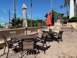 a view of a dinning tables and chairs in the patio