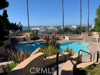 a view of a chairs and table in the patio
