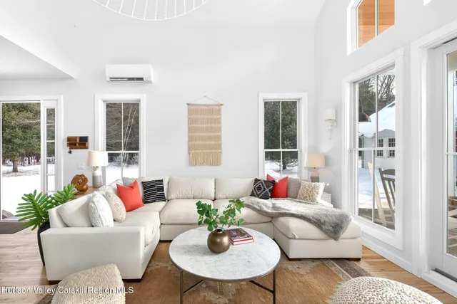 a kitchen with a stove a sink and a wooden cabinets