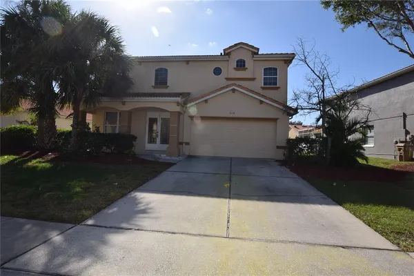 a front view of house with yard