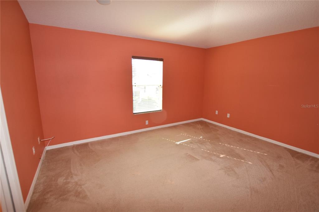 3118 Riachuelo Lane Kissimmee, FL 34744 - Photo 22 of 26 an empty room with a window