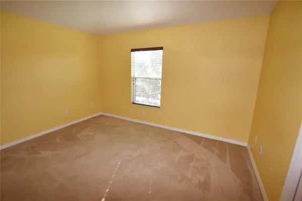 a view of a room with a window