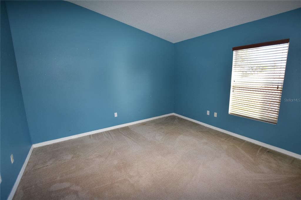 3118 Riachuelo Lane Kissimmee, FL 34744 - Photo 26 of 26 a view of a room with a window