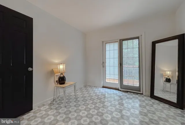 a view of a kitchen with granite countertop stainless steel appliances and wooden floor