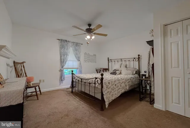 a view of a swimming pool with a table and chairs