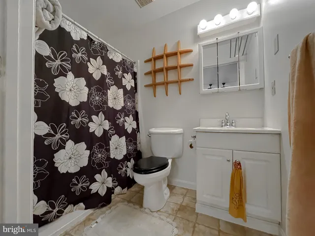 a view of a tree in a yard