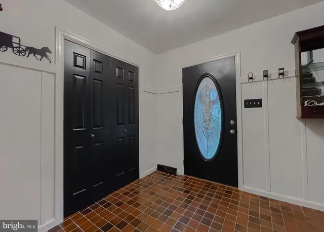 a view of livingroom with workspace