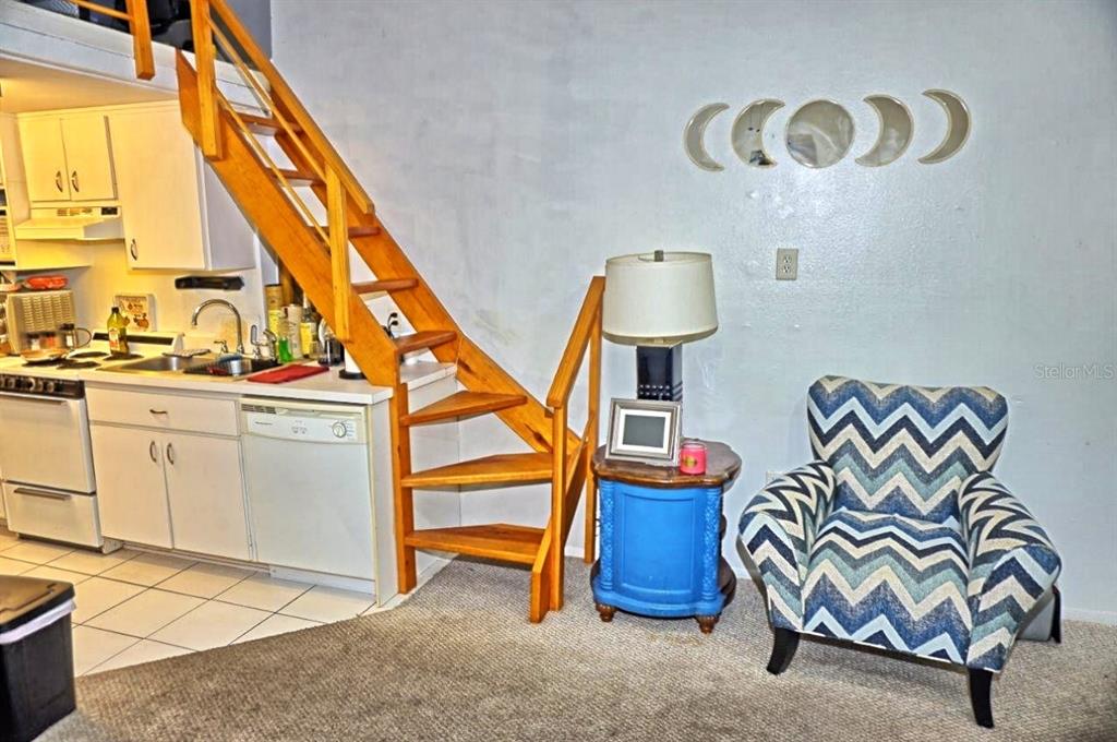 20857 Haulover Cove Road, Unit B14 Lutz, FL 33558 - Photo 6 of 35 a view of an entryway with wooden floor
