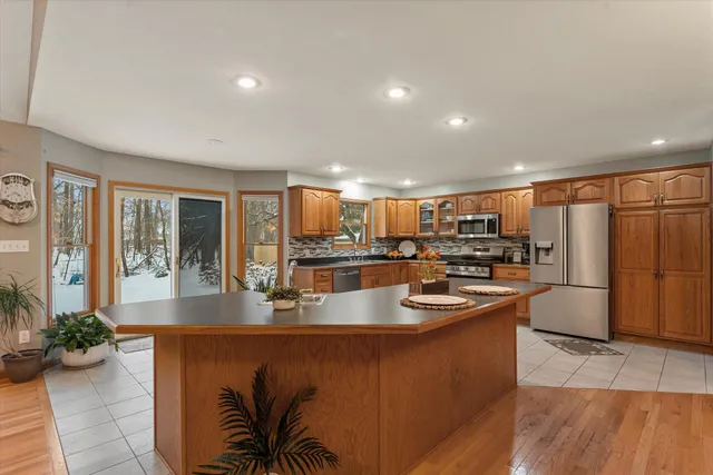 $440,000 | 68640 Christiana Lake Road, Edwardsburg, MI 49112