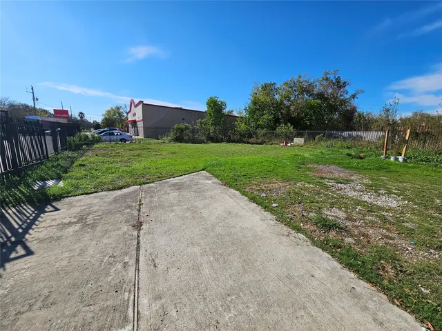 a view of a field with next to a yard