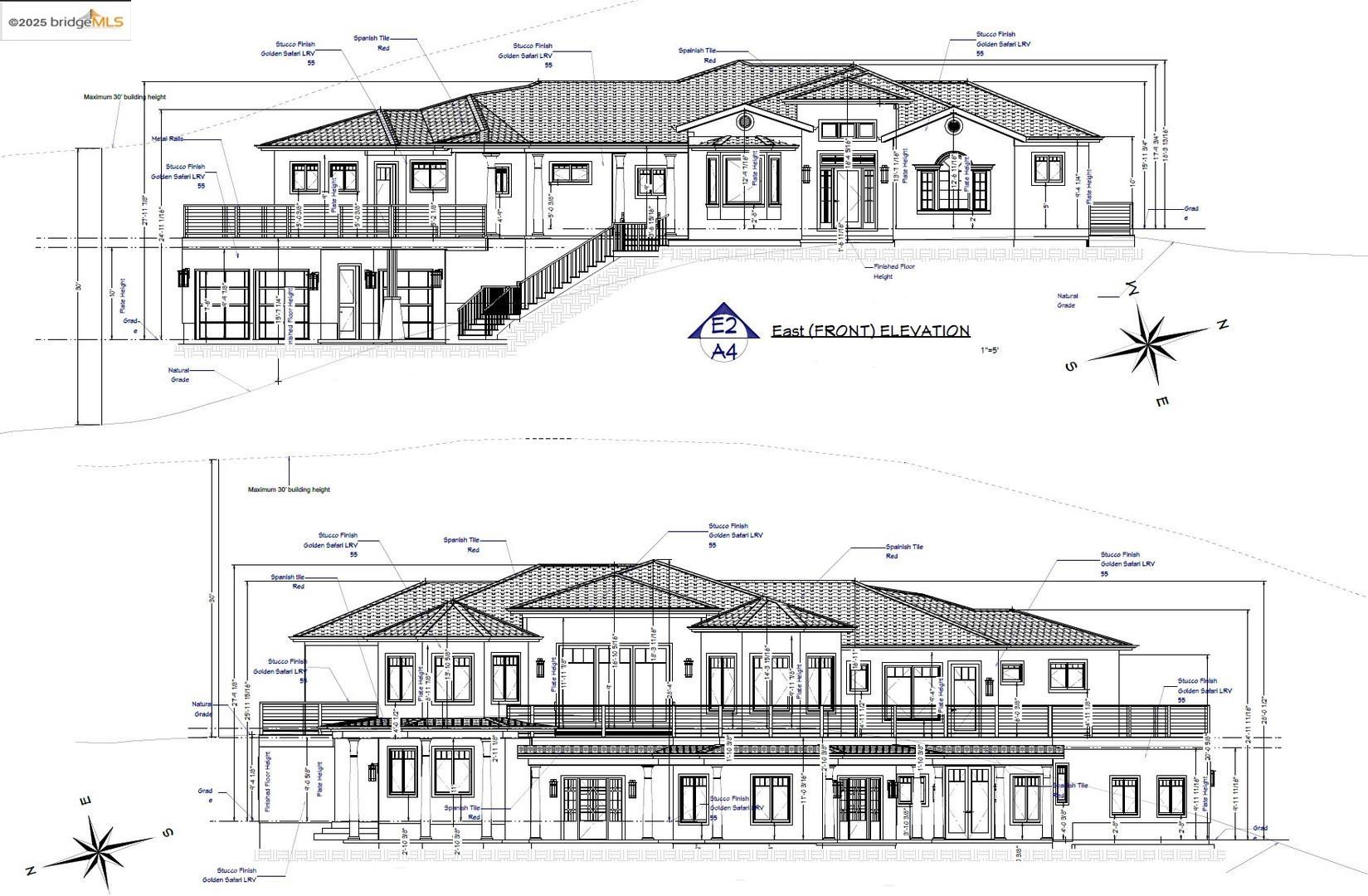 a front view of a building with a street