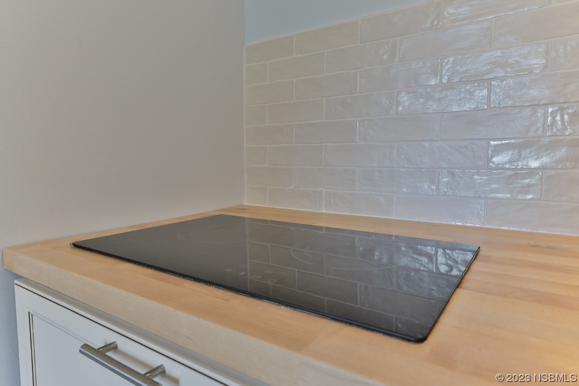 133 Milton Road Daytona Beach, FL 32118 - Photo 43 of 70 a close up of a bathtub in a bathroom