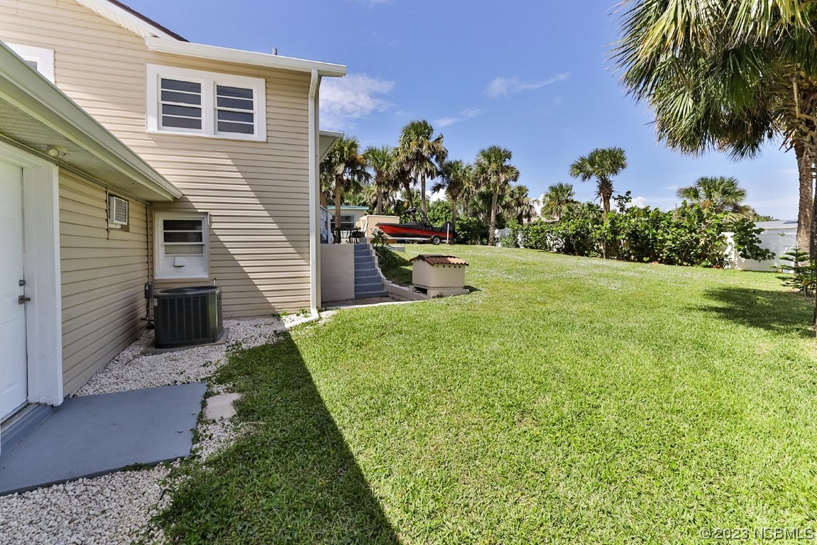 133 Milton Road Daytona Beach, FL 32118 - Photo 54 of 70 a view of a backyard with a garden