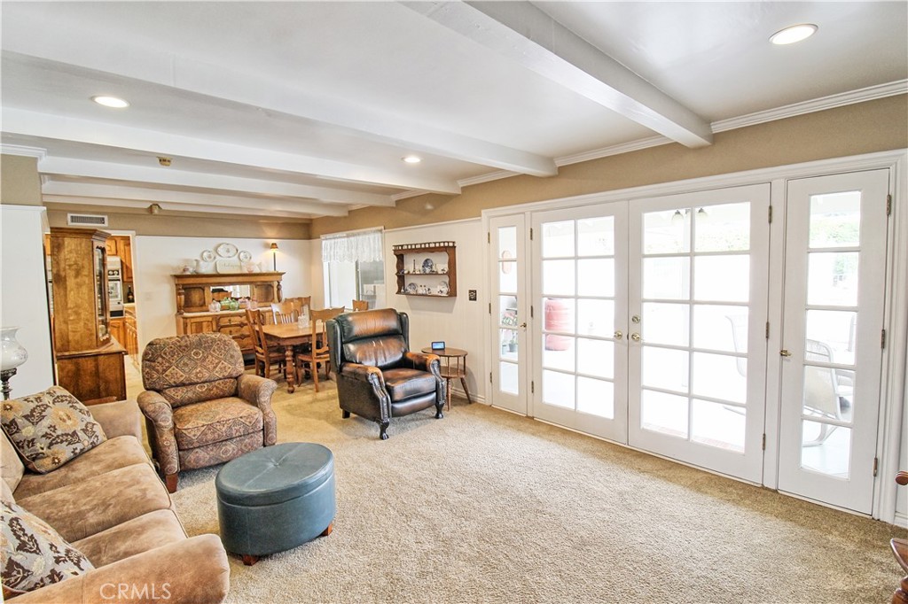 1203 Hidden Springs Lane Glendora, CA 91741 - Photo 12 of 47 a living room with furniture and a large window