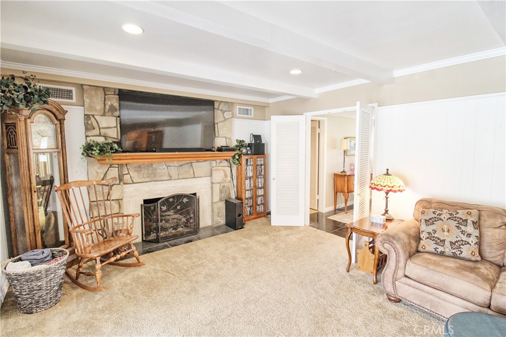 1203 Hidden Springs Lane Glendora, CA 91741 - Photo 15 of 47 a living room with furniture and a fireplace