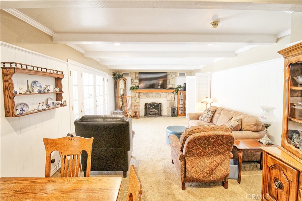 1203 Hidden Springs Lane Glendora, CA 91741 - Photo 16 of 47 a living room with furniture fireplace and window