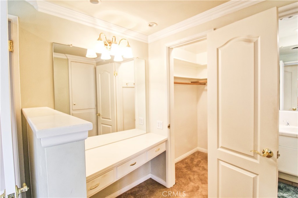 1203 Hidden Springs Lane Glendora, CA 91741 - Photo 33 of 47 a bathroom with a sink and a mirror