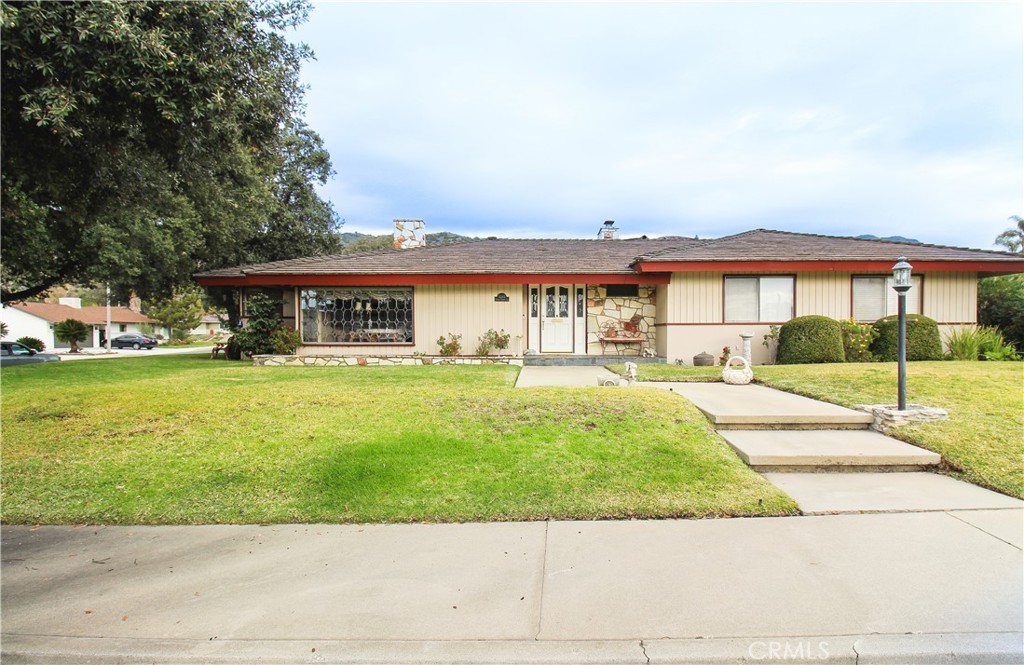 1203 Hidden Springs Lane Glendora, CA 91741 - Photo 46 of 47 a front view of a house with garden
