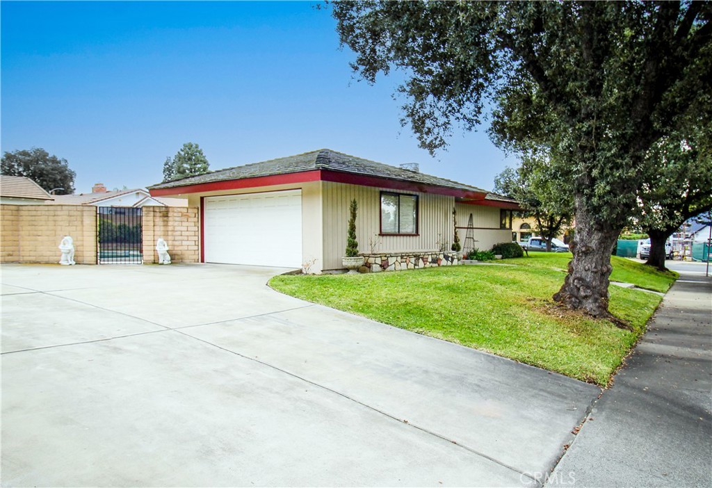 1203 Hidden Springs Lane Glendora, CA 91741 - Photo 7 of 47 a front view of house with yard and green space