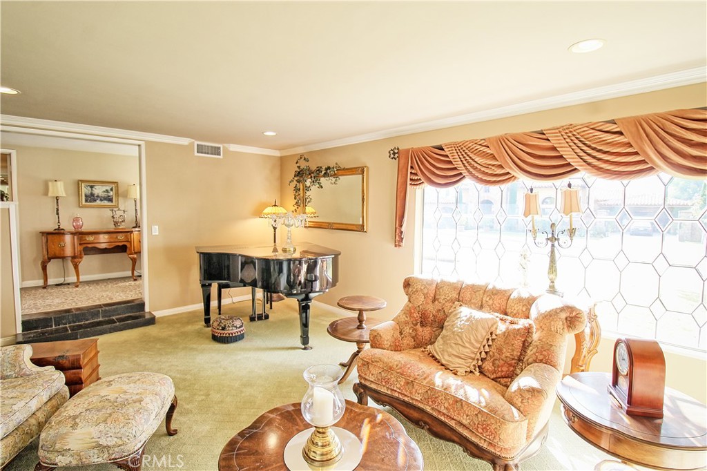 1203 Hidden Springs Lane Glendora, CA 91741 - Photo 10 of 47 a living room with furniture and a large window