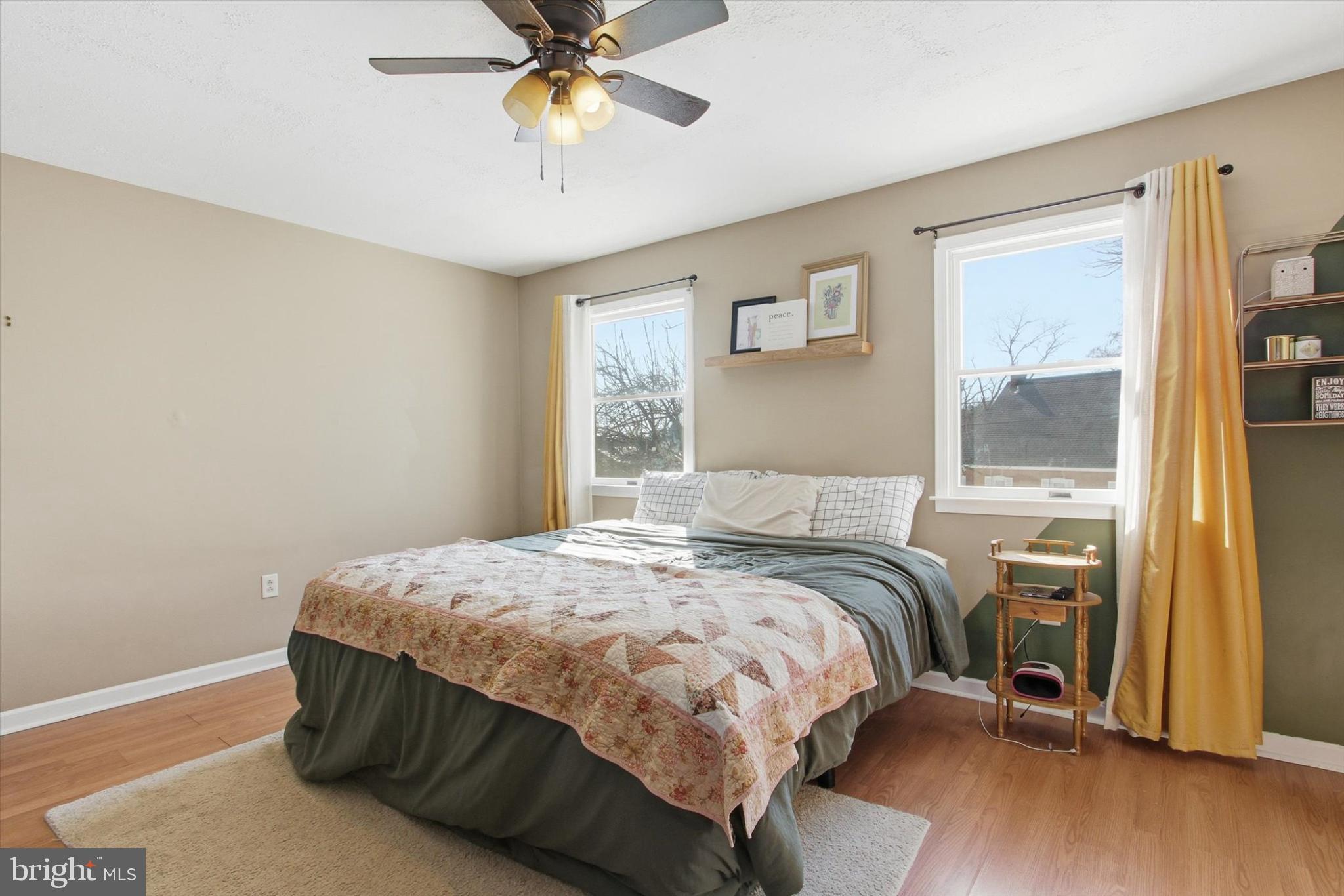 794 Barrett Street Hanover, PA 17331 - Photo 11 of 22 a bedroom with a bed and a chandelier