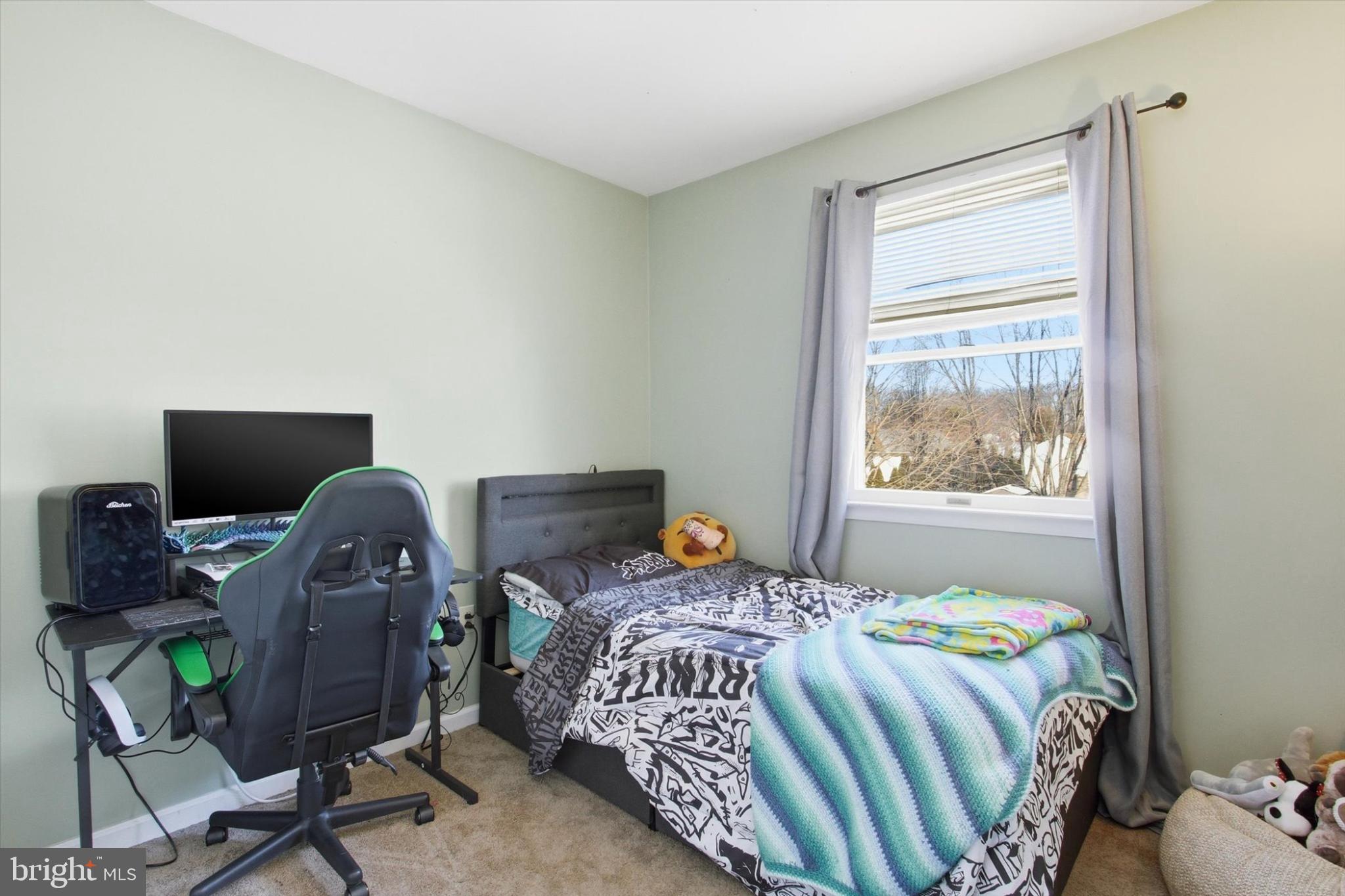 794 Barrett Street Hanover, PA 17331 - Photo 13 of 22 a bedroom with a bed and a window