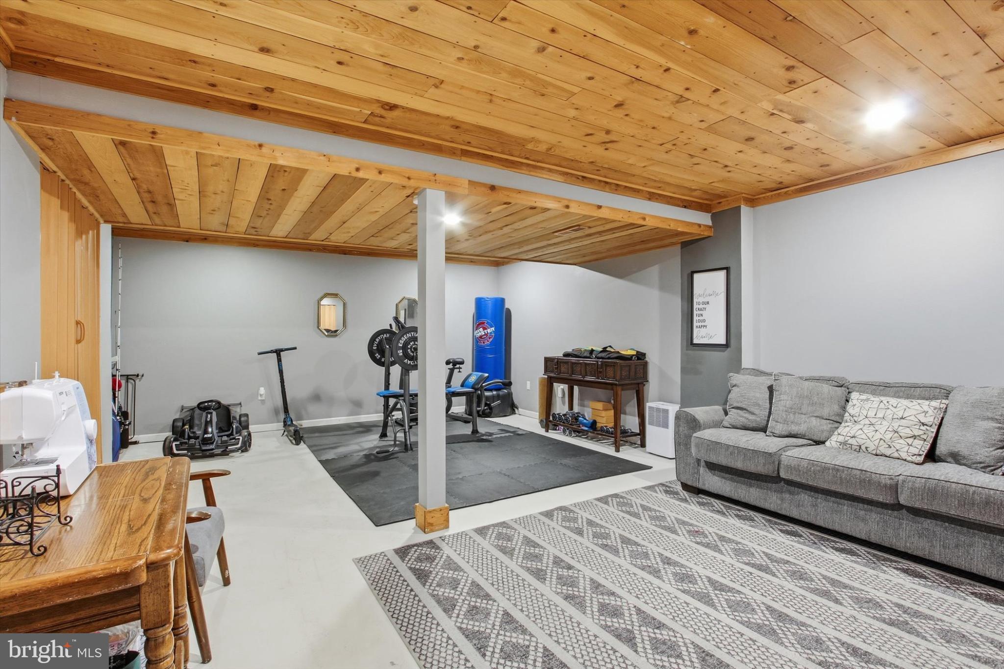 794 Barrett Street Hanover, PA 17331 - Photo 15 of 22 a living room with furniture and a wooden floor