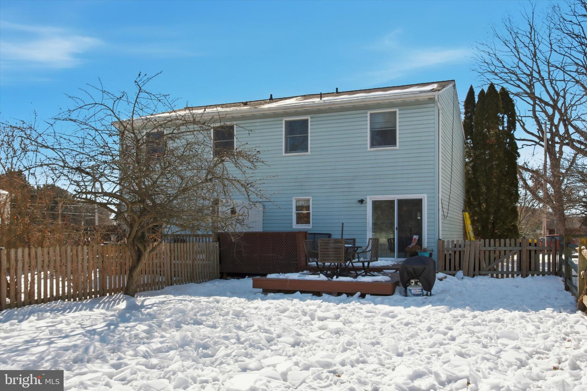 794 Barrett Street Hanover, PA 17331 - Photo 19 of 22 a backyard of a house with fire pit and outdoor seating