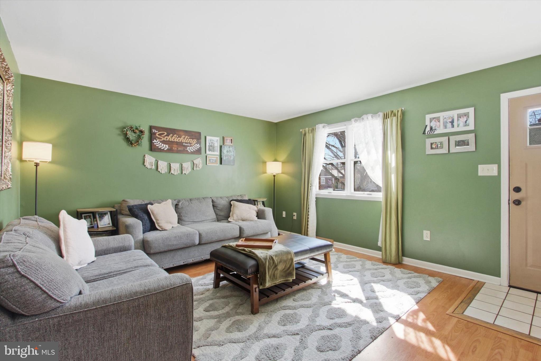 794 Barrett Street Hanover, PA 17331 - Photo 2 of 22 a living room with furniture and a window