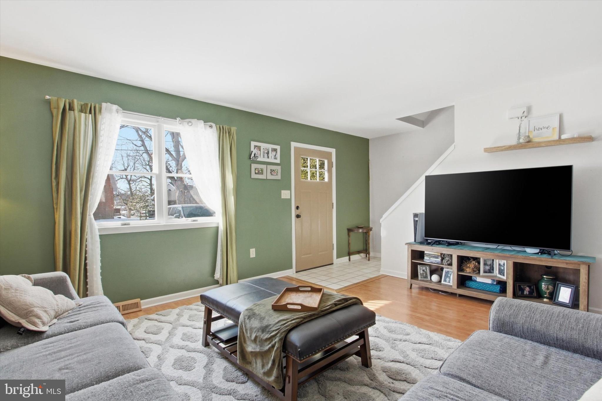 794 Barrett Street Hanover, PA 17331 - Photo 3 of 22 a living room with furniture and a flat screen tv