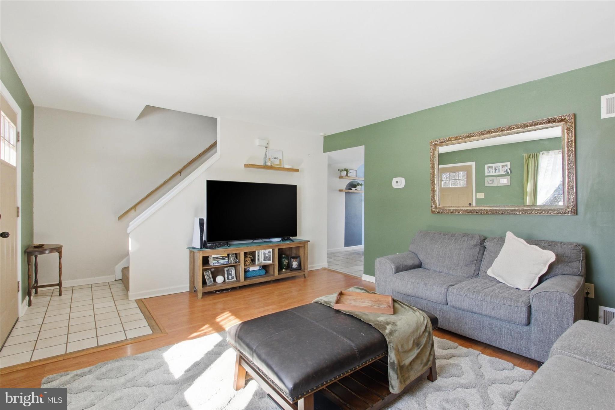 794 Barrett Street Hanover, PA 17331 - Photo 4 of 22 a living room with furniture and a flat screen tv