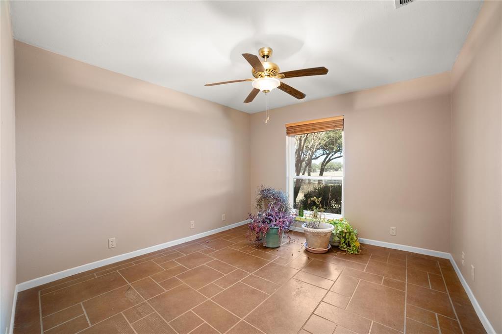 451 County Road 423 May, TX 76857 - Photo 18 of 40 a view of a room with window and hardwood floor