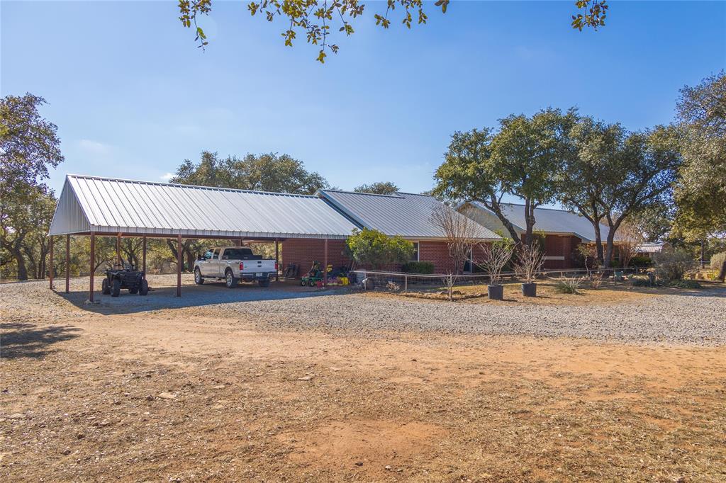 451 County Road 423 May, TX 76857 - Photo 39 of 40 a view of a house with a yard