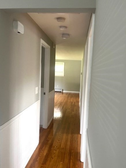 72 Elmore Street Holyoke, MA 01040 - Photo 11 of 28 a view of a hallway with wooden floor