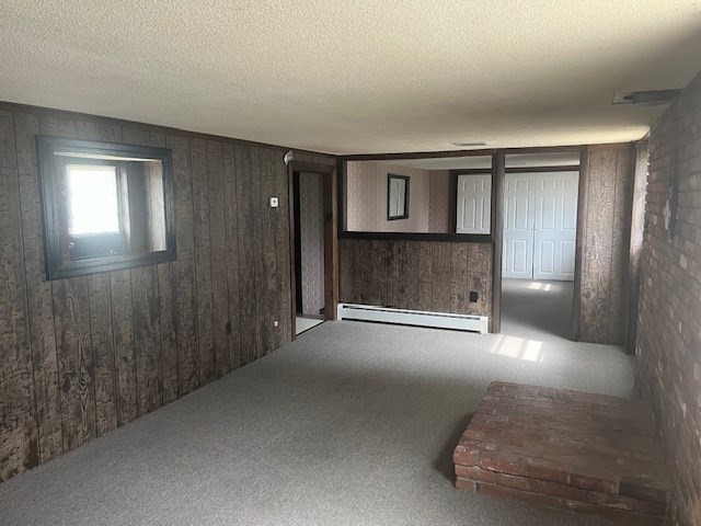 72 Elmore Street Holyoke, MA 01040 - Photo 14 of 28 a view of empty room with windows and fireplace