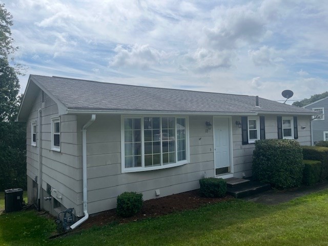 72 Elmore Street Holyoke, MA 01040 - Photo 27 of 28 a view of an house with backyard space and porch