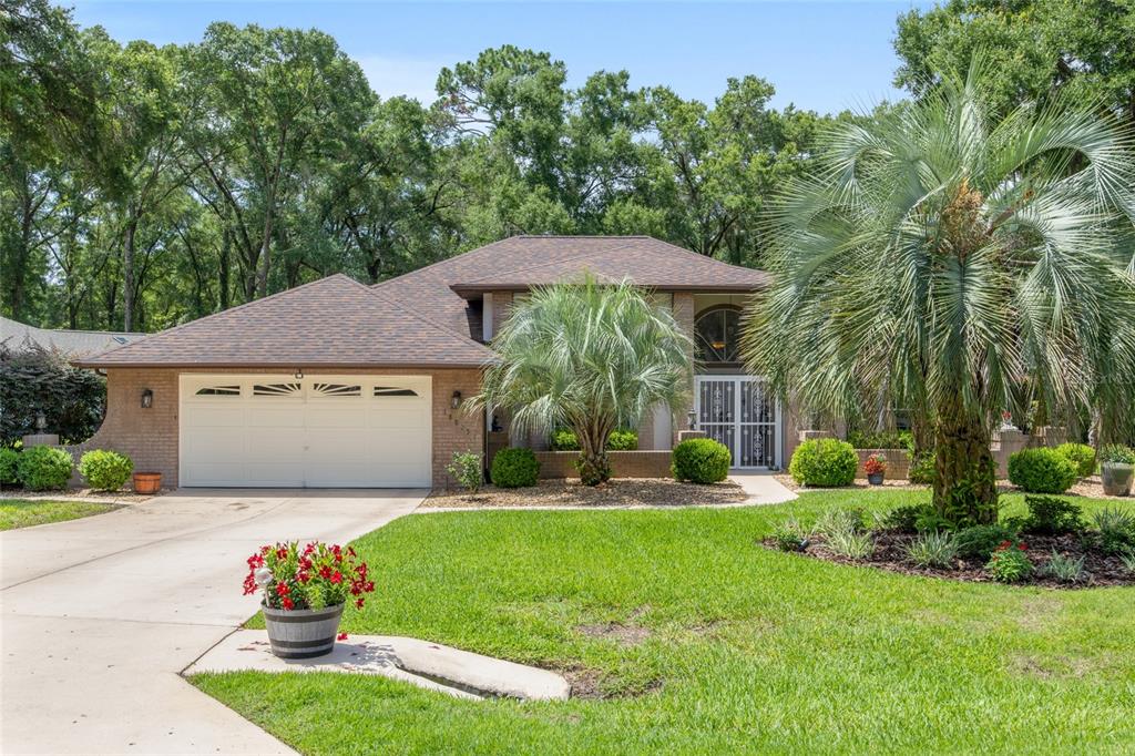 18825 Southwest 93rd Loop Dunnellon, FL 34432 - Photo 6 of 85 a front view of house with yard and green space